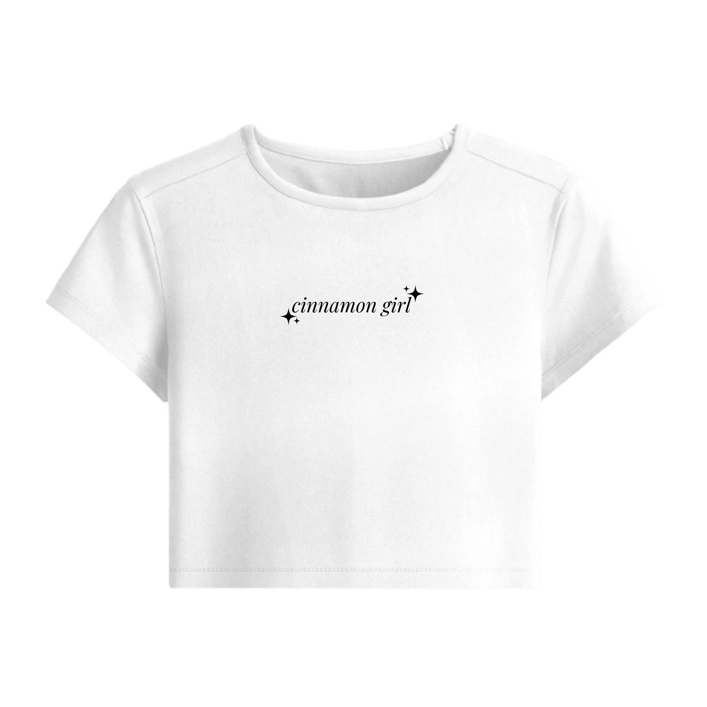 White crop top with 'cinnamon girl' text on a white background